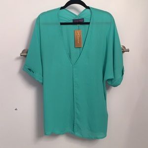 Never worn, flowy v-neck blouse!